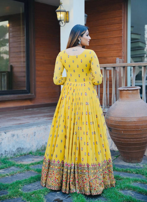 Georgette Base Yellow Color Heavy Embroidered Gown With Full Sleeves
