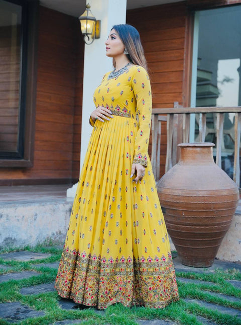 Georgette Base Yellow Color Heavy Embroidered Gown With Full Sleeves